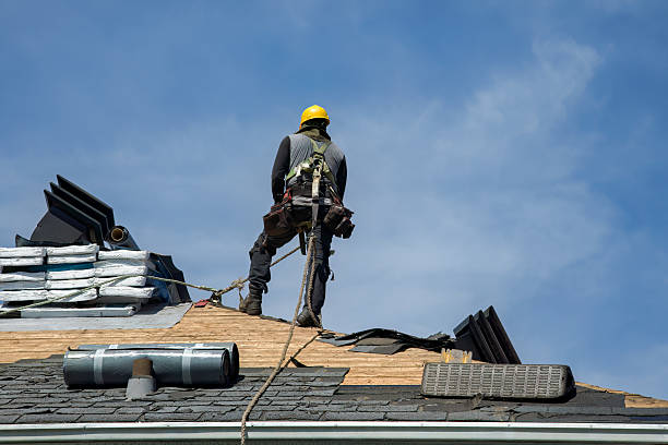 Professional Roof Replacement technician working in Kenyon, RI